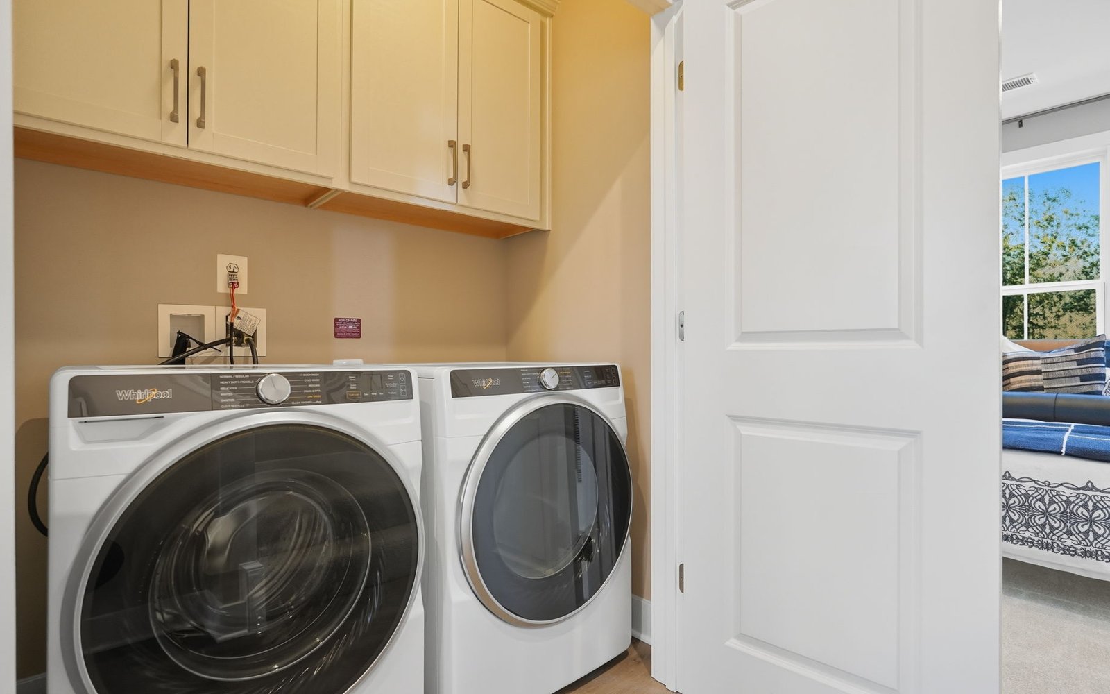 The laundry room of the Amber by Brookfield Residential.