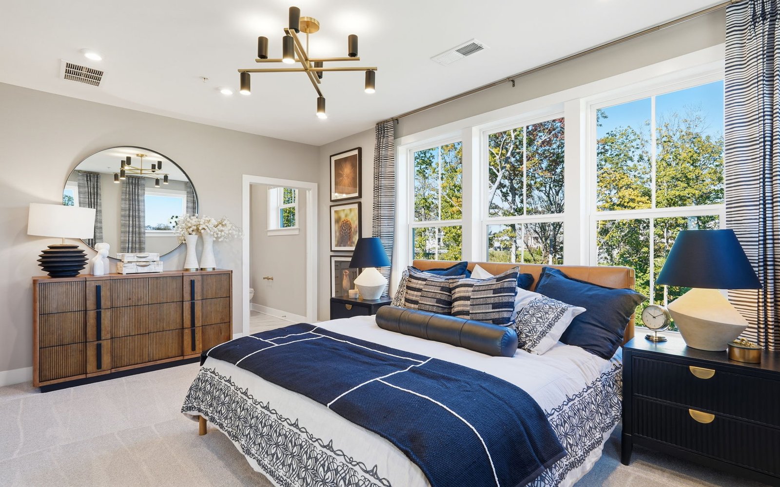 The primary bedroom of the Amber by Brookfield Residential.