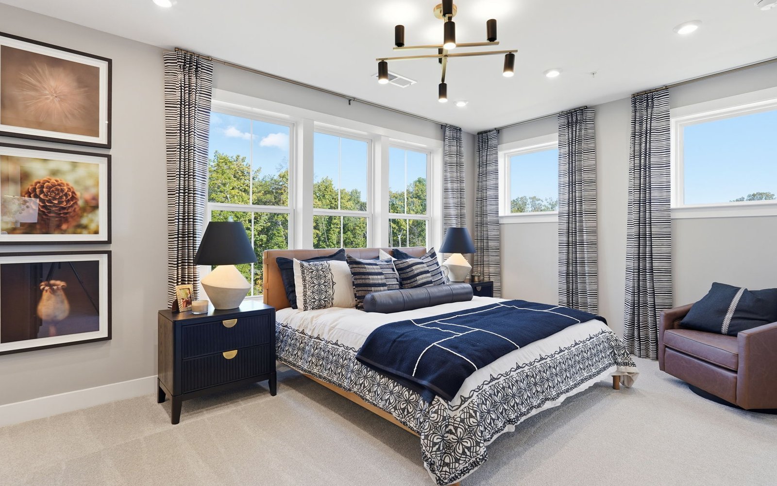 The primary bedroom of the Amber by Brookfield Residential.