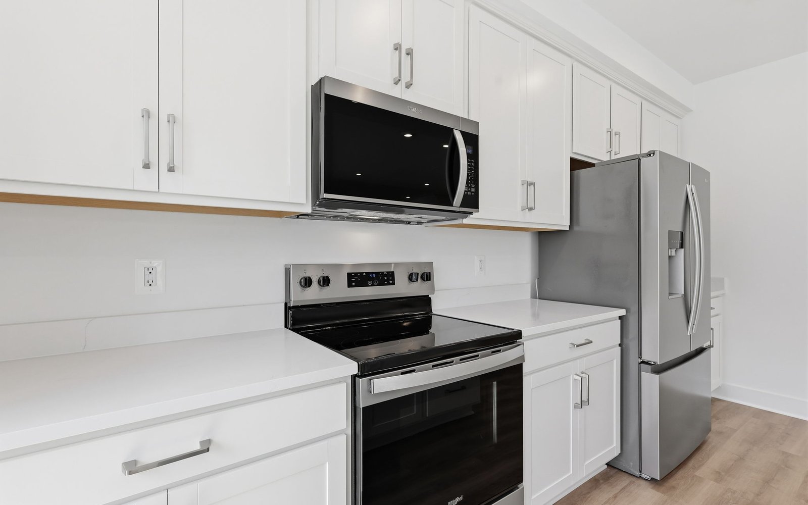 The kitchen layout showcasing the included package 1 finishes in the Amber at Cascades at Embrey Mill.