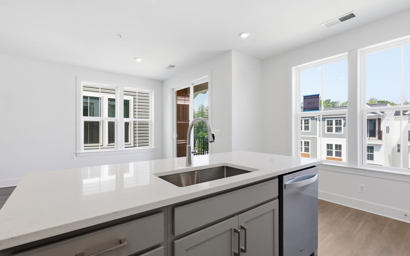 The kitchen island of included selection package 2 in the Scarlet at Cascades at Embrey Mill.