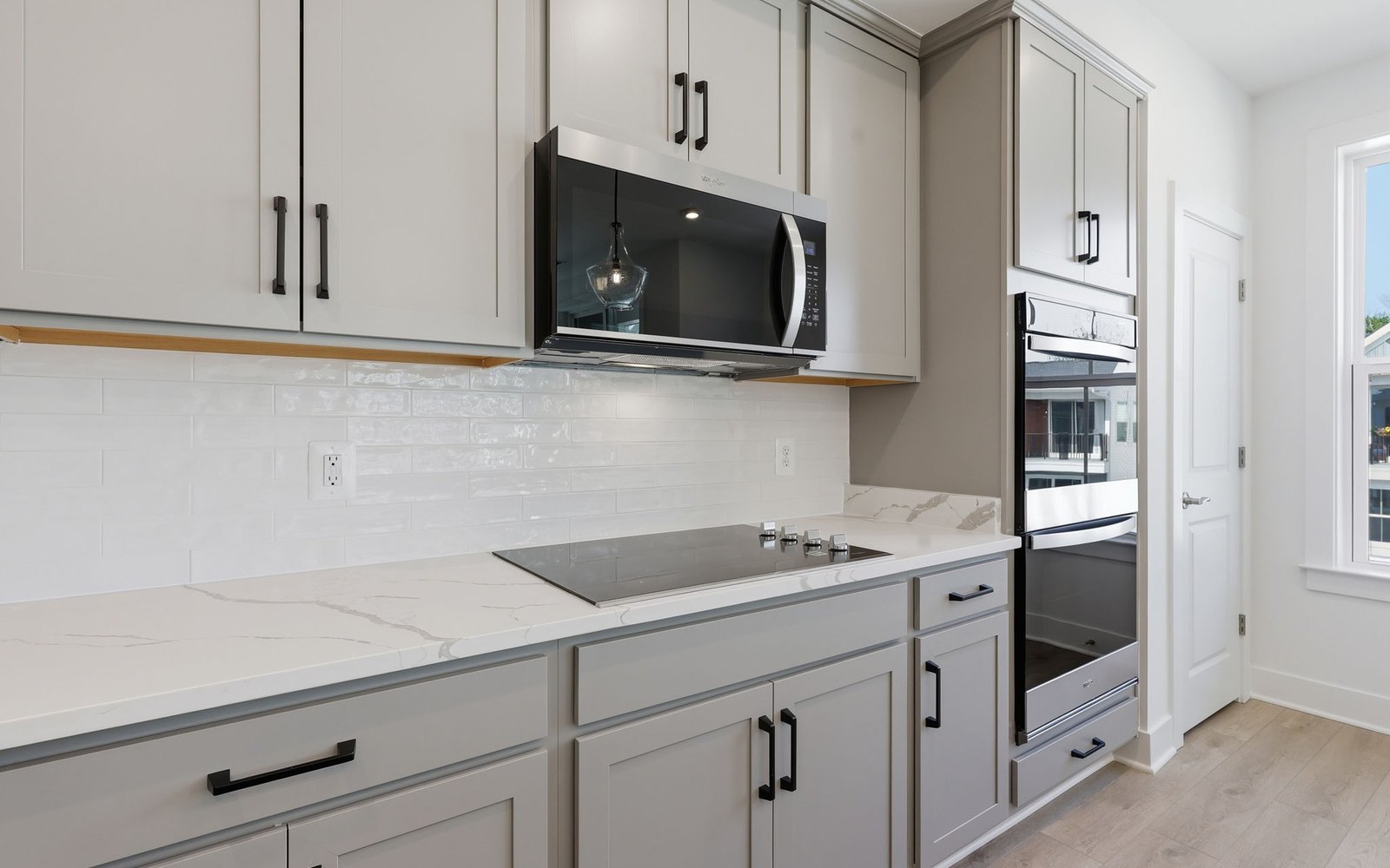 The kitchen detail showcasing the upgraded package 2 finishes in the Scarlet at Cascades at Embrey Mill.