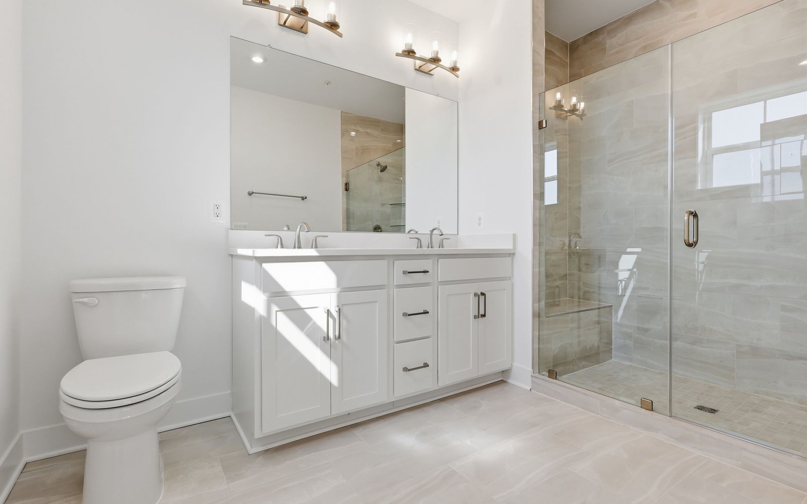 The primary bathroom showcasing the upgraded package 2 finishes in the Scarlet at Cascades at Embrey Mill.