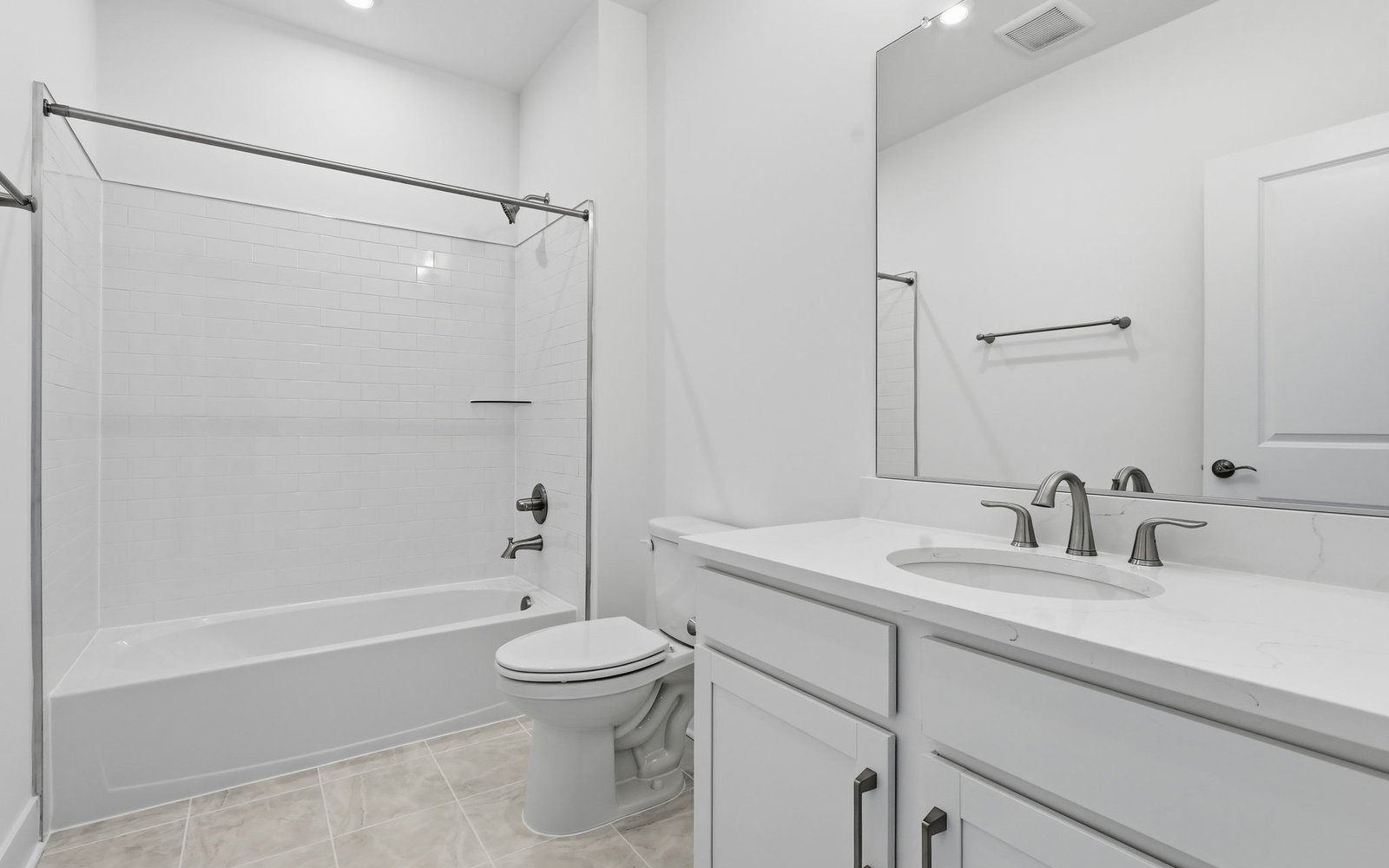 The secondary bathroom showcasing the upgraded package 2 finishes in the Scarlet at Cascades at Embrey Mill.