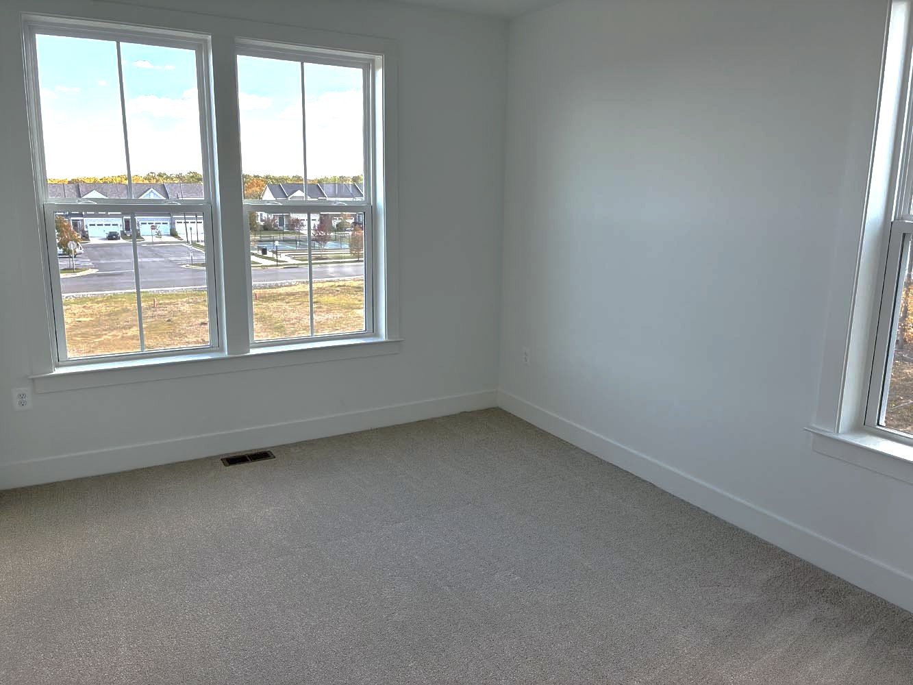 A secondary bedroom of the Amber on homesite 101 by Brookfield Residential at Cascades at Embrey Mill.