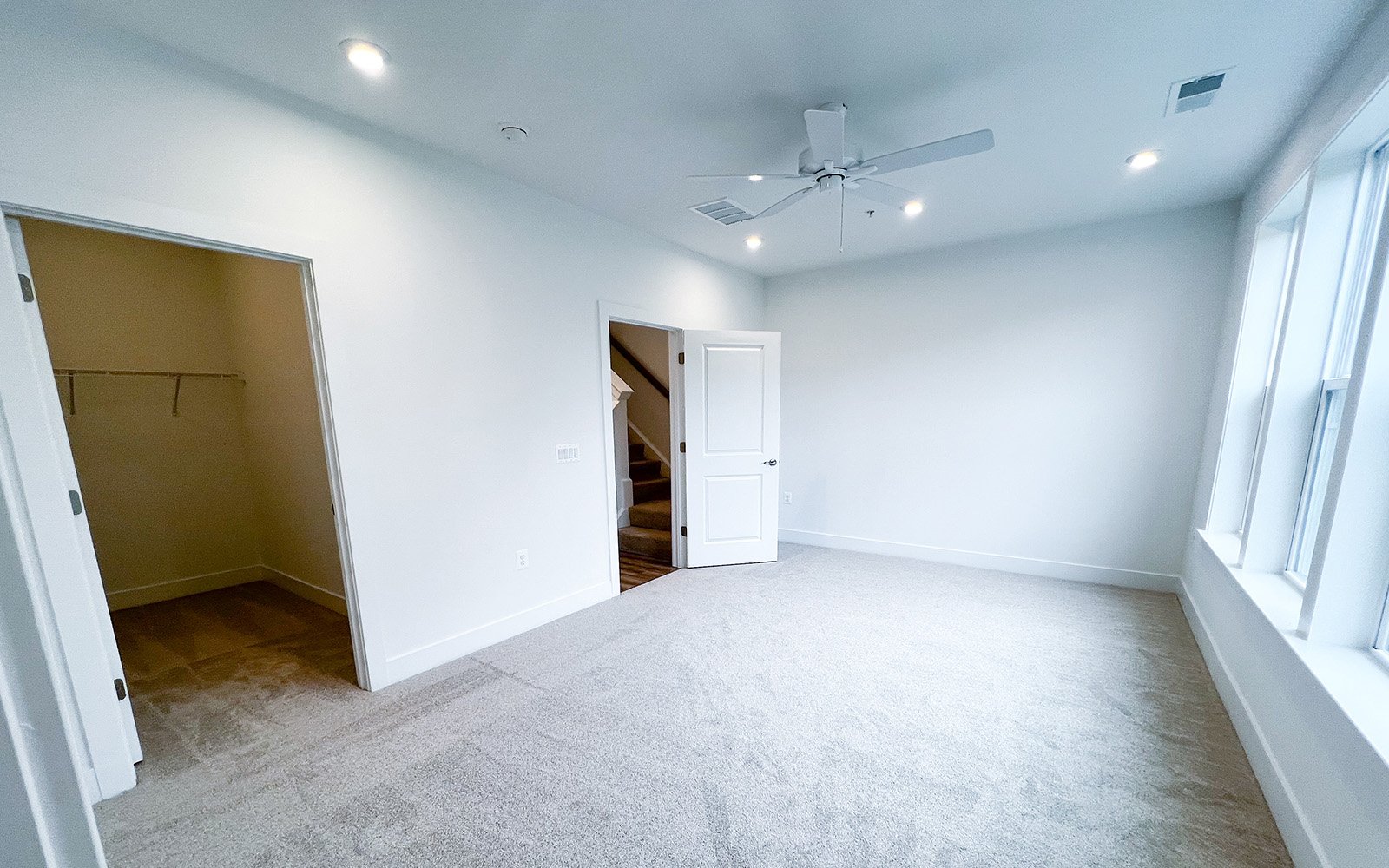 The primary bedroom of the Amber on homesite 107 at Cascades at Embrey Mill by Brookfield Residential.