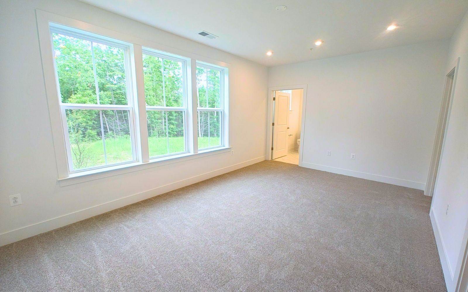 The primary bedroom of the Amber on homesite 1219 at Cascades at Embrey Mill.