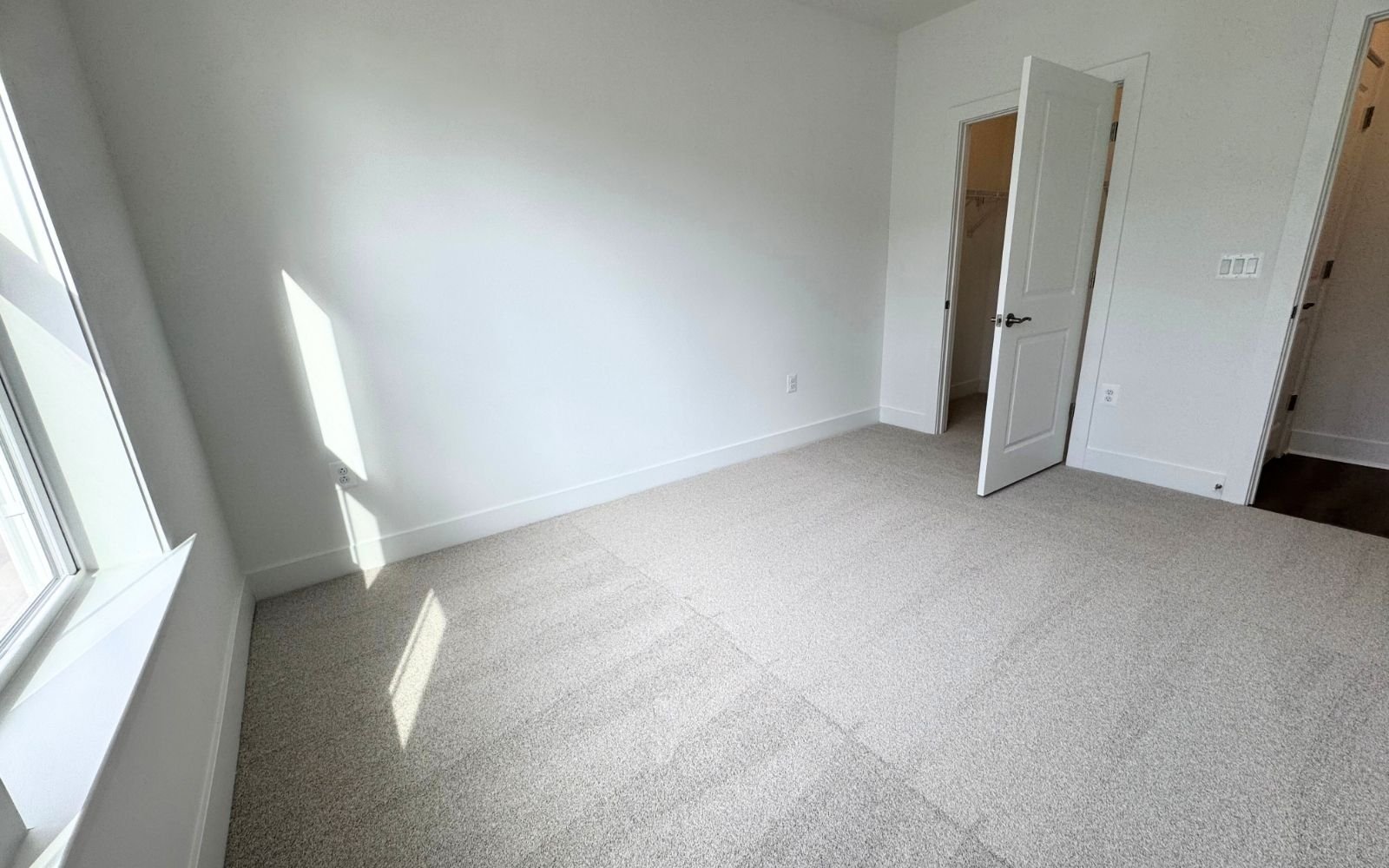 A secondary bedroom of the Amber on homesite 131 at Cascades at Embrey Mill.