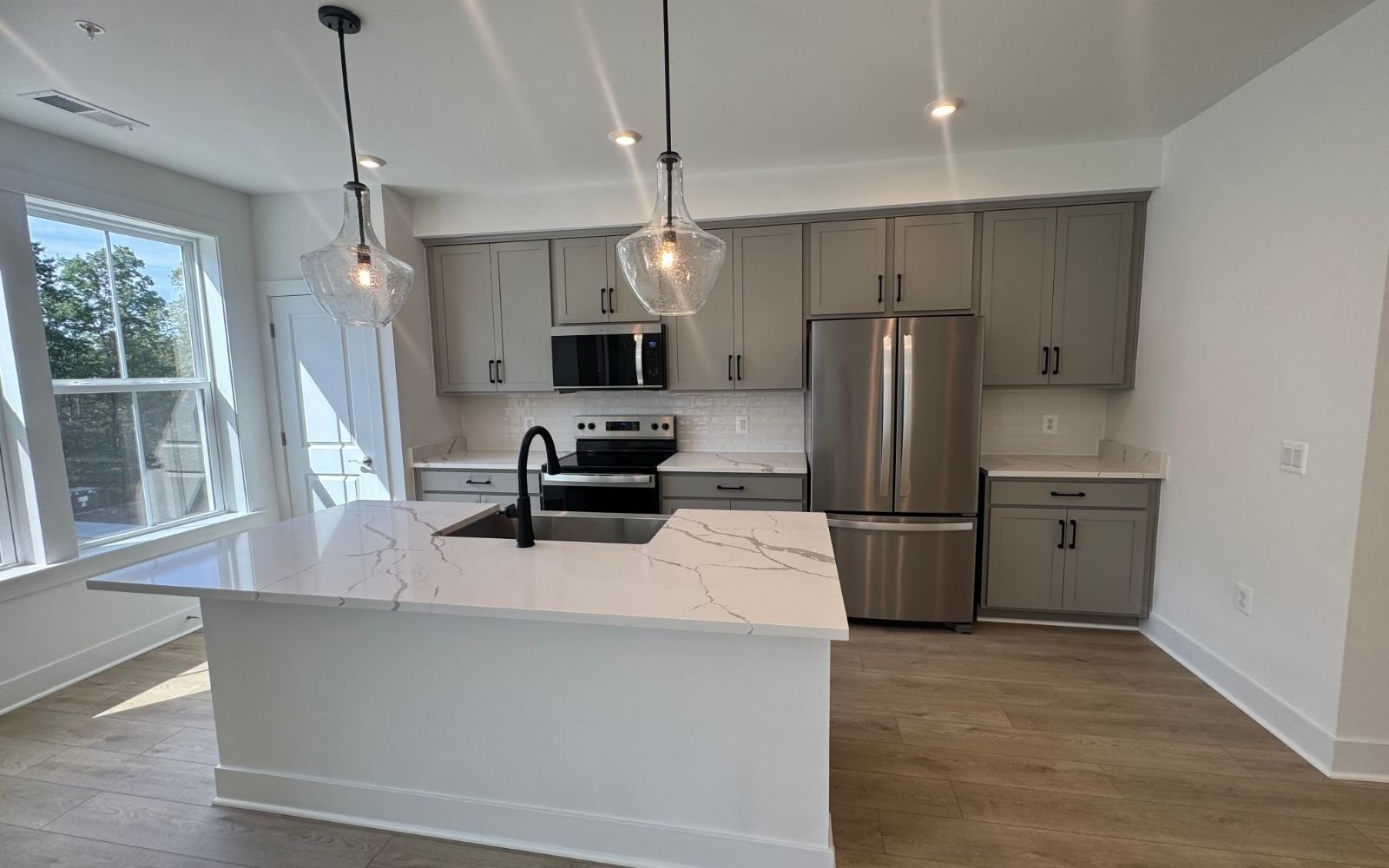 The kitchen of the Amber on homesite 139 at Cascades at Embrey Mil.