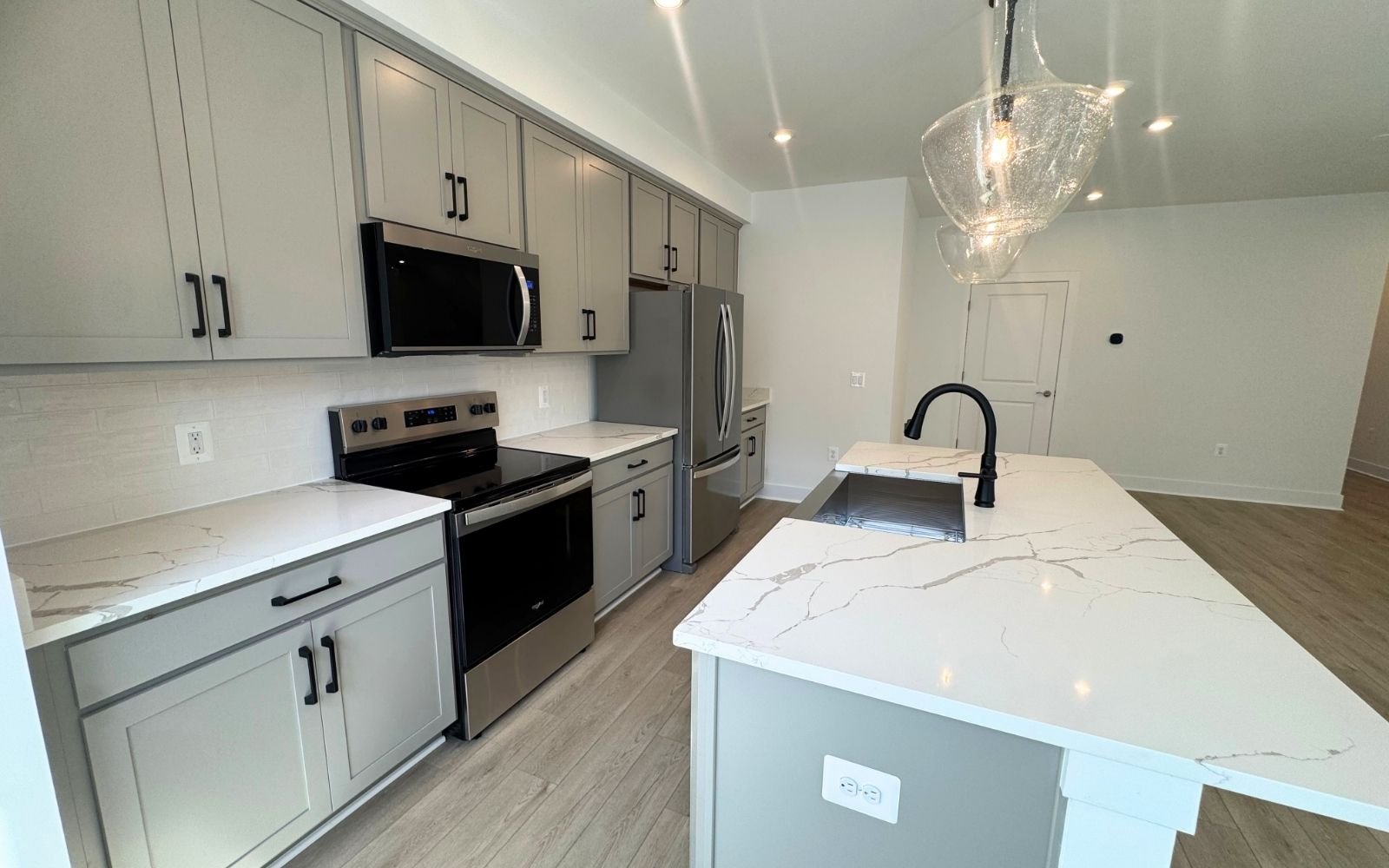 The kitchen of the Amber on homesite 139 at Cascades at Embrey Mil.
