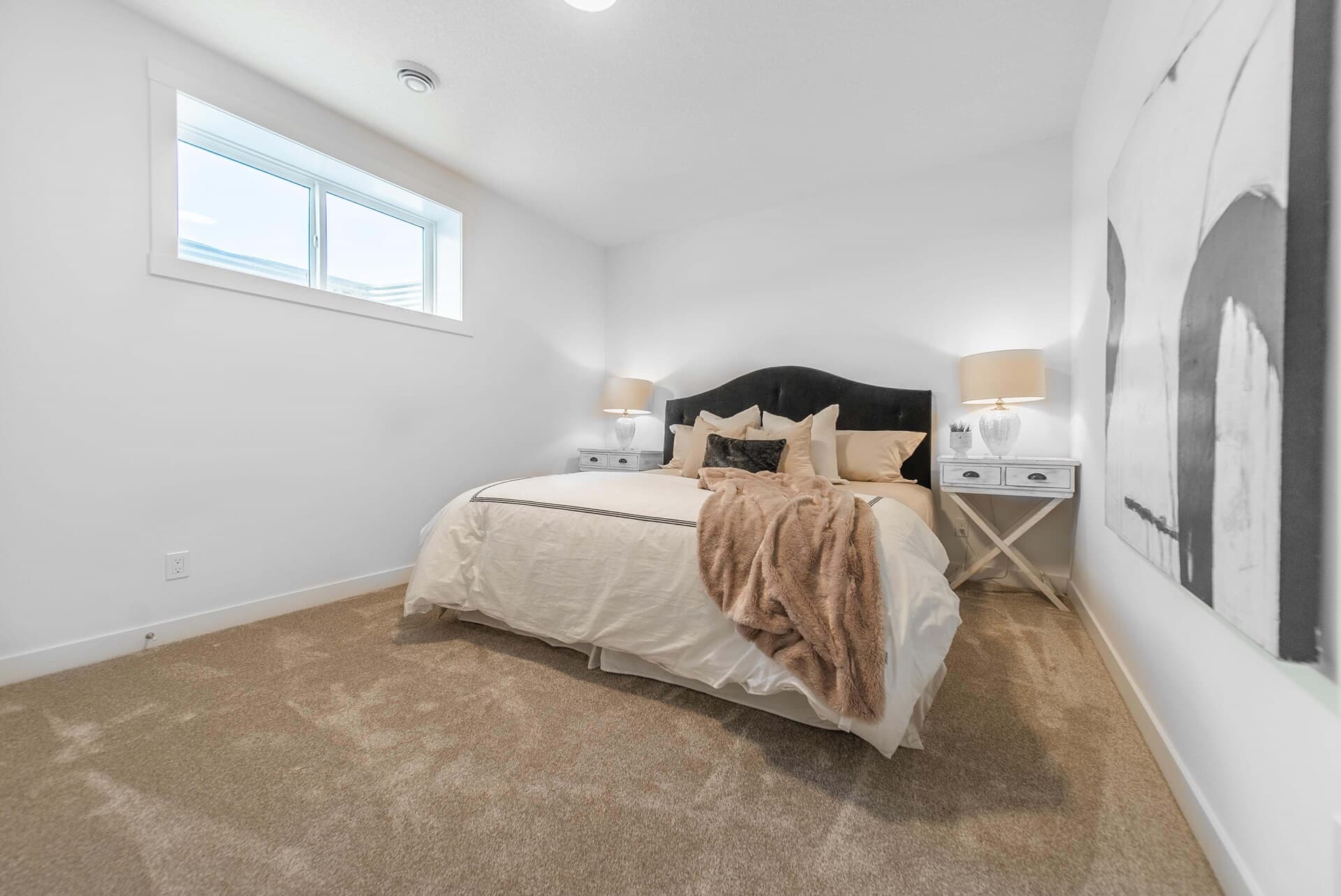 A photo of the basement bedroom of the Monaco 28 showhome by Brookfield Residential