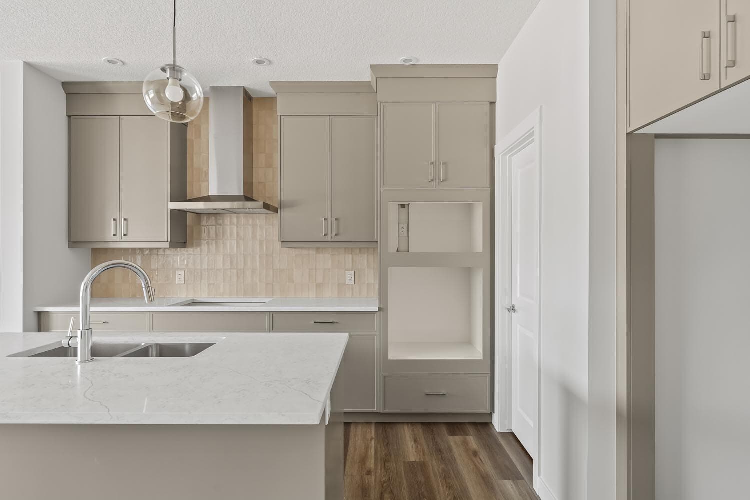 A photo of the front garage quick possession home at 144 Creekstone Circle SW in Creekstone by Brookfield Residential