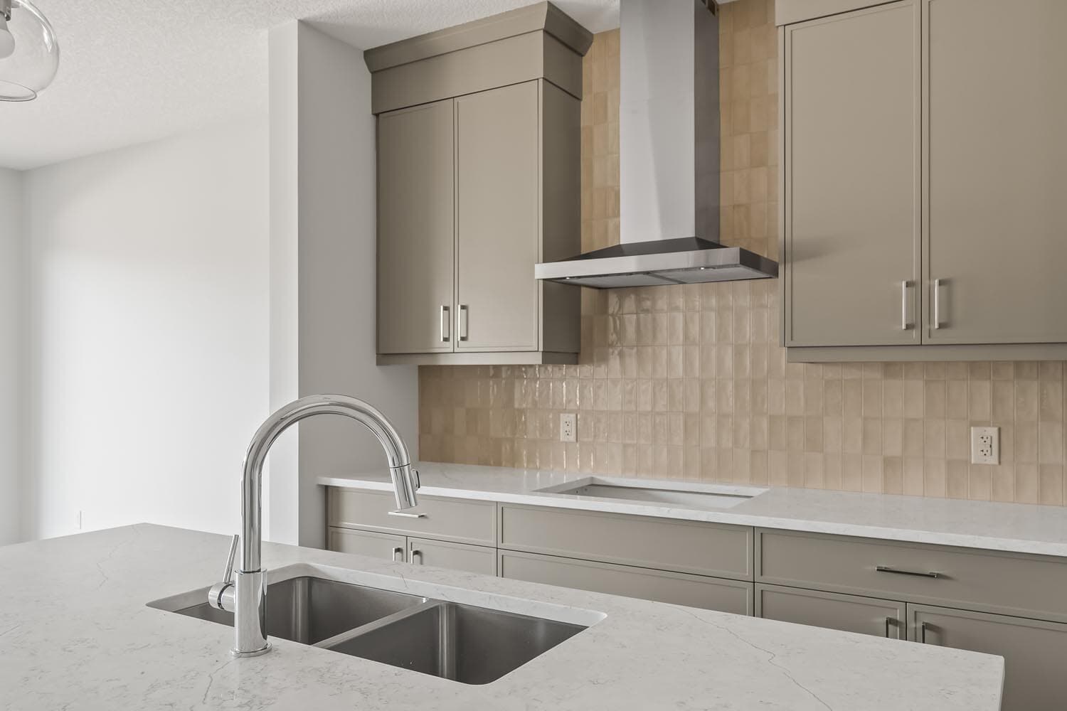 A photo of the front garage quick possession home at 144 Creekstone Circle SW in Creekstone by Brookfield Residential