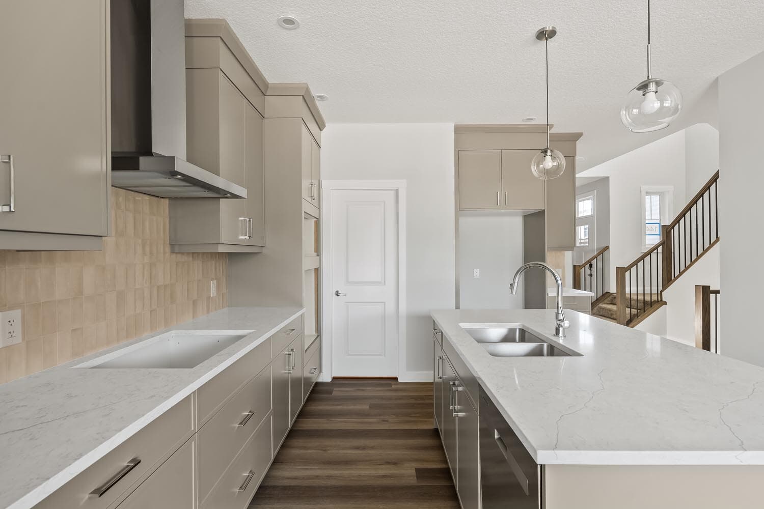 A photo of the front garage quick possession home at 144 Creekstone Circle SW in Creekstone by Brookfield Residential