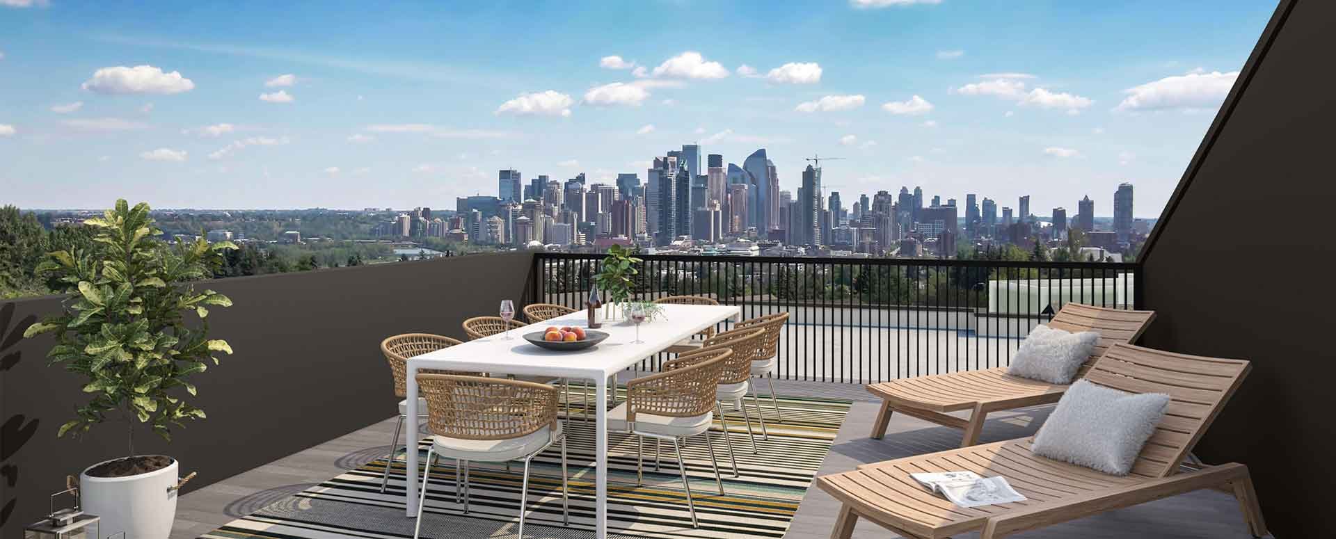 A view of the downtown Calgary skyline from a rooftop patio in Crown Park