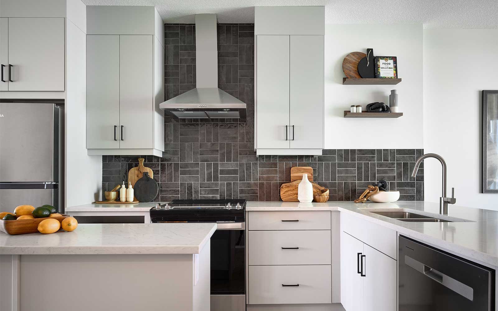 A photo of the kitchen in the Alameda show home in Crown Park by Brookfield Residential