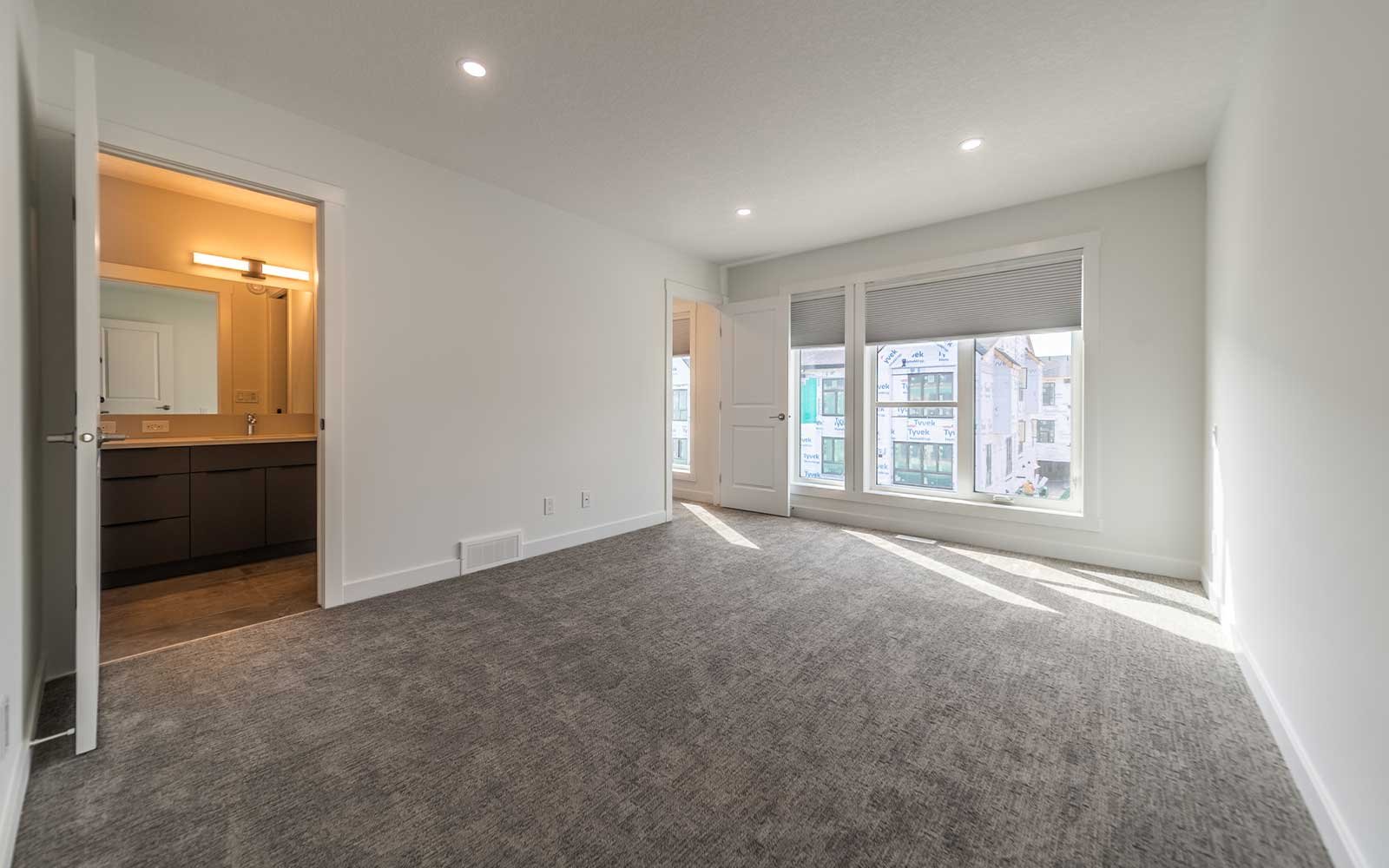 A photo of the primary bedroom of the Stanley model townhome in Calgary by Brookfield Residential