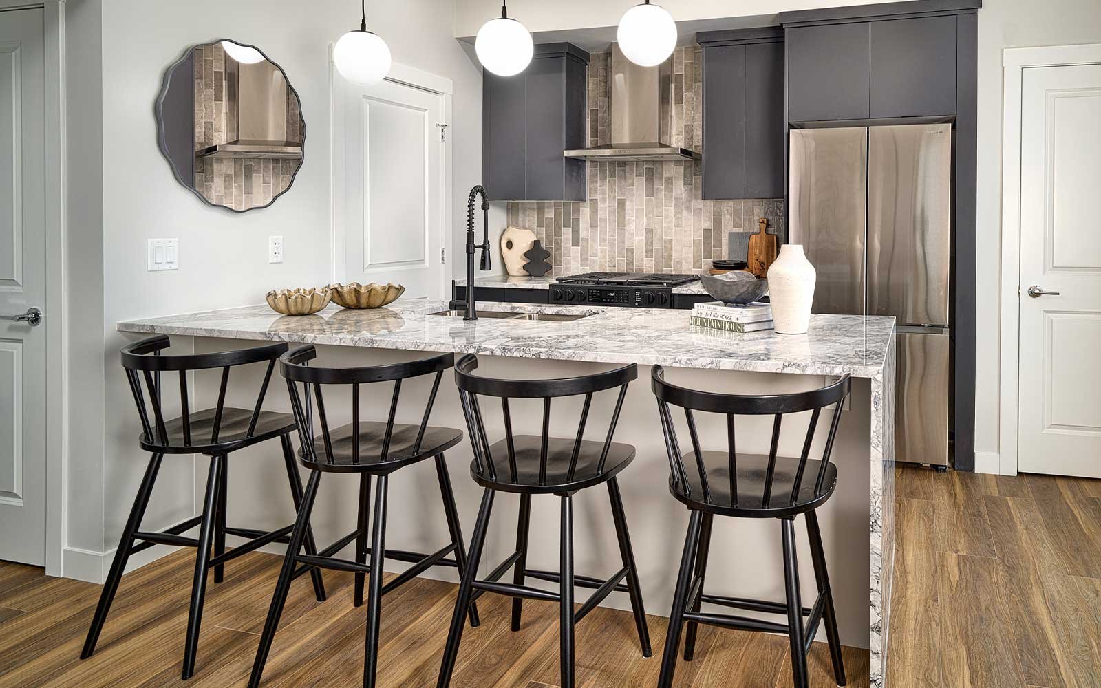 A photo of the kitchen of the Brubeck townhome model in Calgary by Brookfield Residential