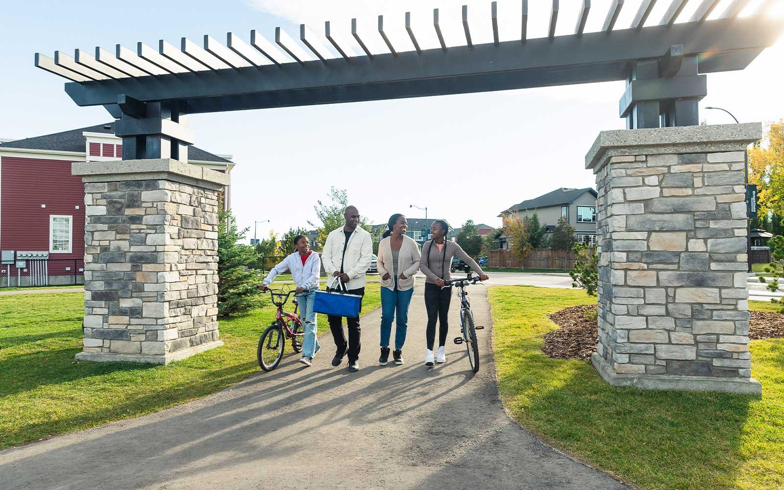 A family enjoys a bike ride in Silver Spruce