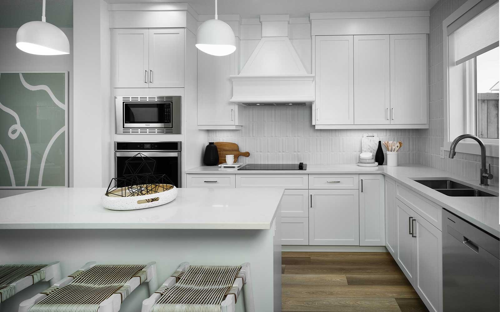 A photo of the kitchen in the Alder duplex model by Brookfield Residential