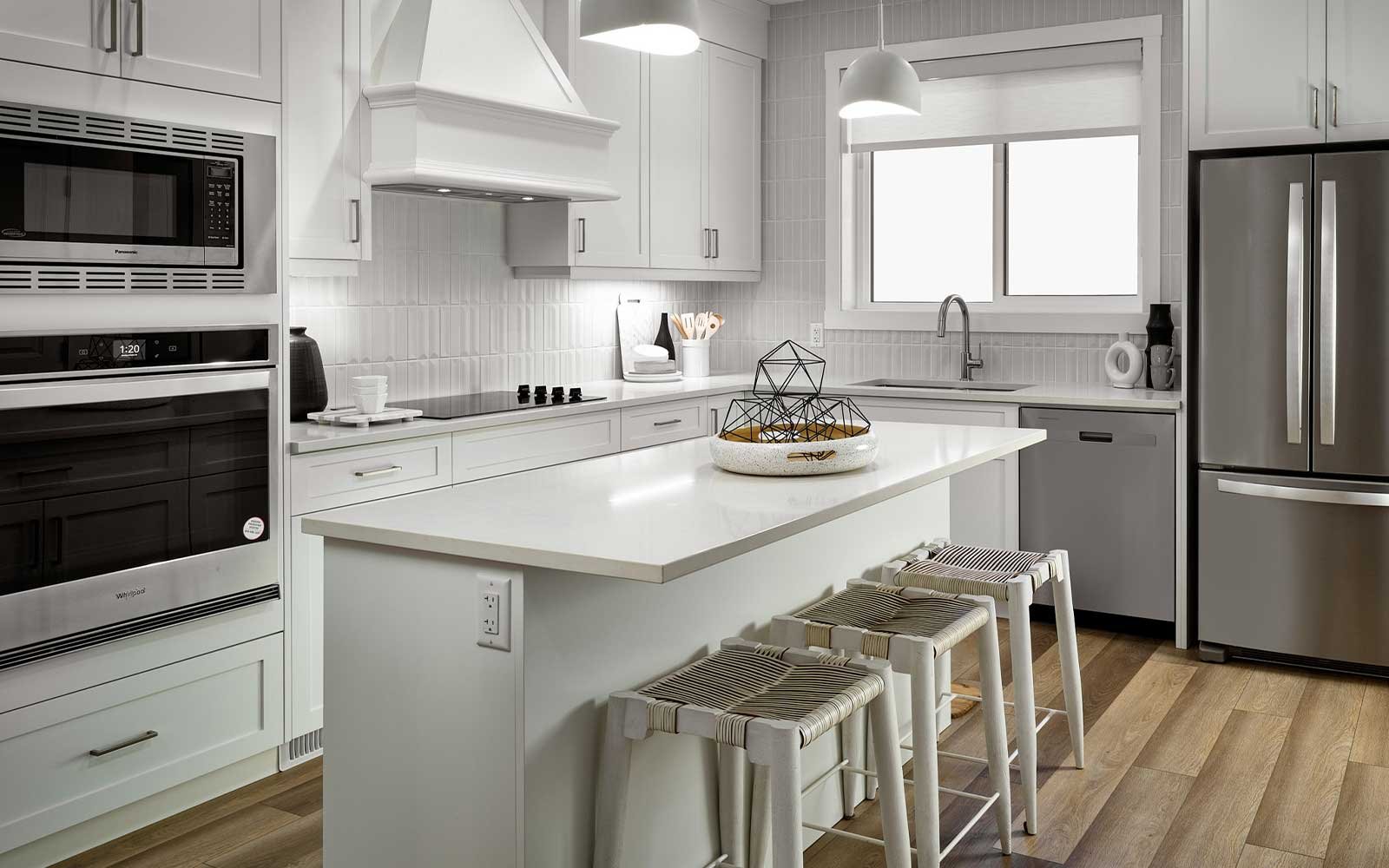 A photo of the kitchen in the Alder duplex model by Brookfield Residential