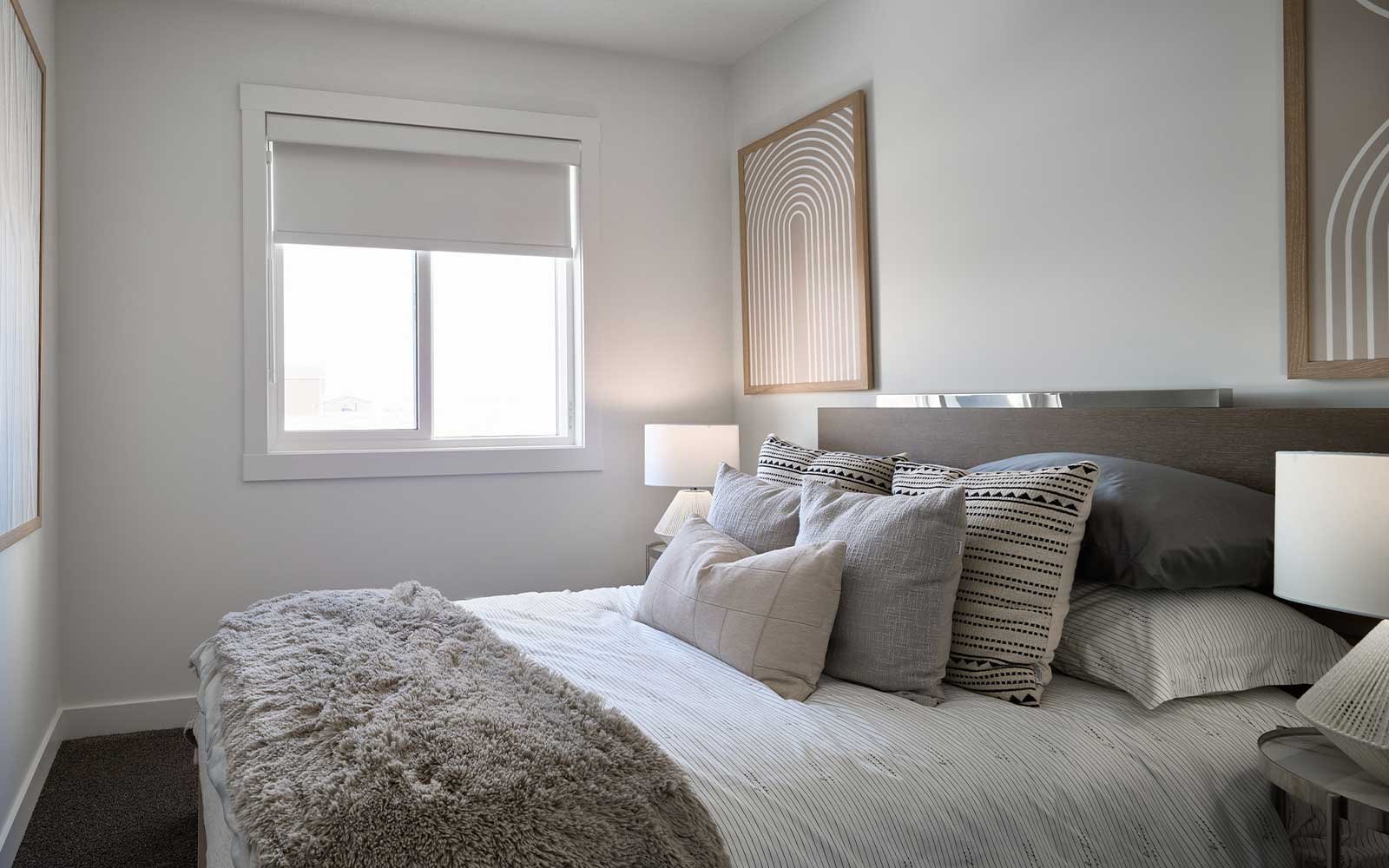 A photo of the secondary bedroom in the Alder duplex model by Brookfield Residential