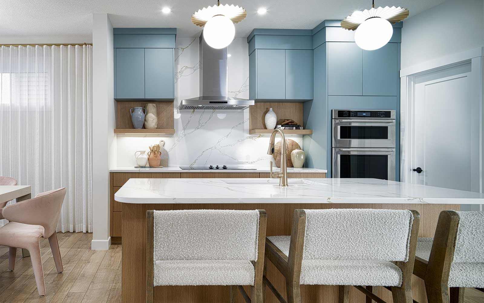 A photo the kitchen of the Purcell 2 - 26 model in Chinook Gate by Brookfield Residential