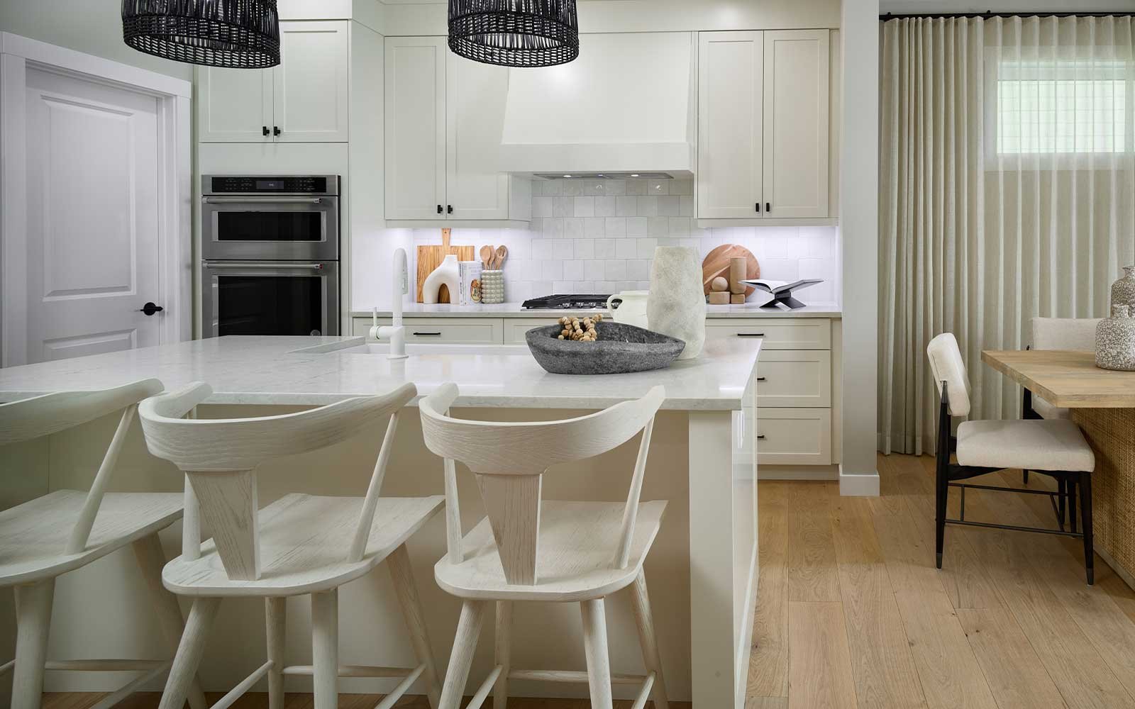 A photo of the kitchen in the Purcell 26 show home in Calgary by Brookfield Residential