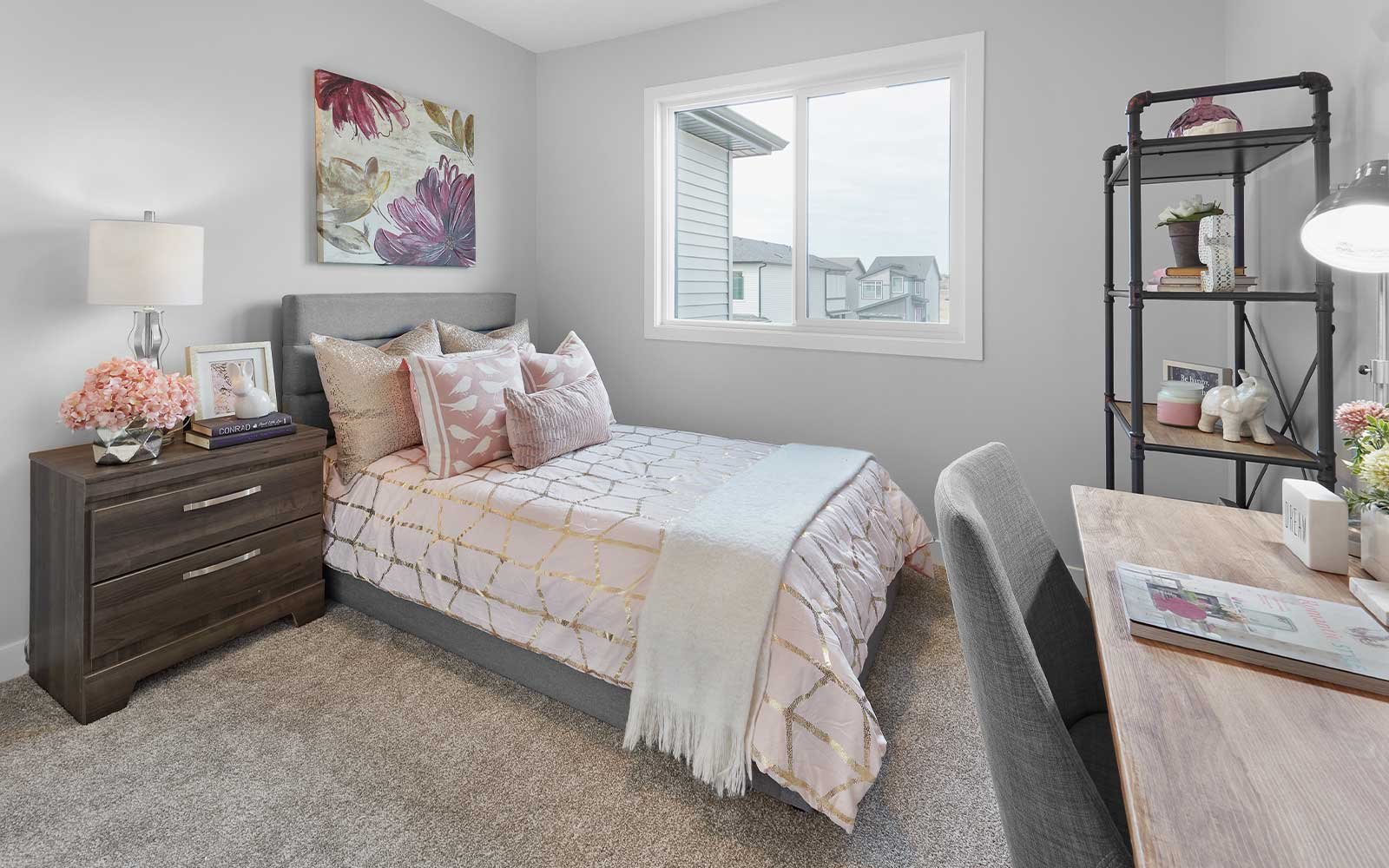 A photo of the secondary bedroomof the Birch duplex model by Brookfield Residential