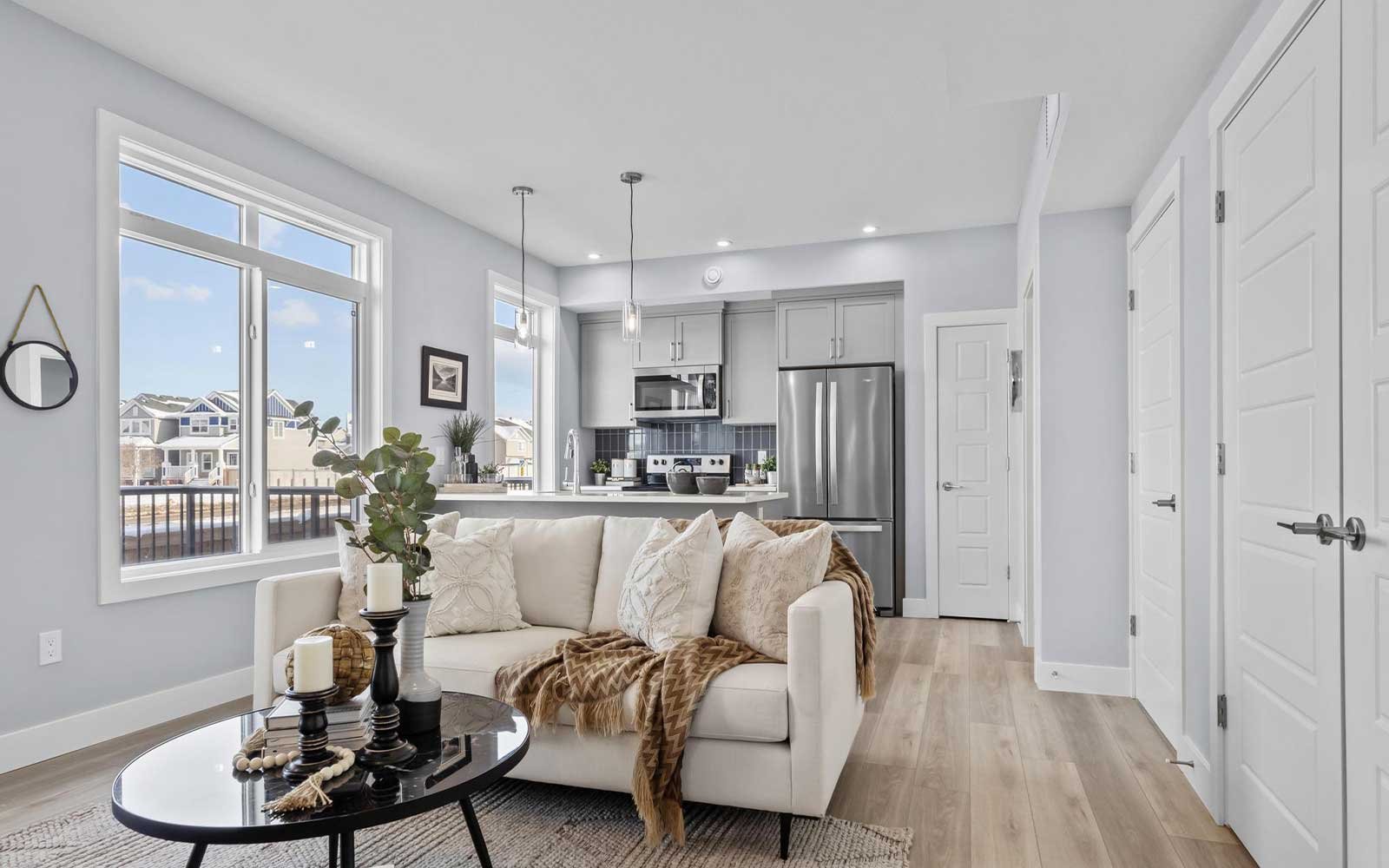 A photo of the great room of the Coltrane townhome model by Brookfield Residential