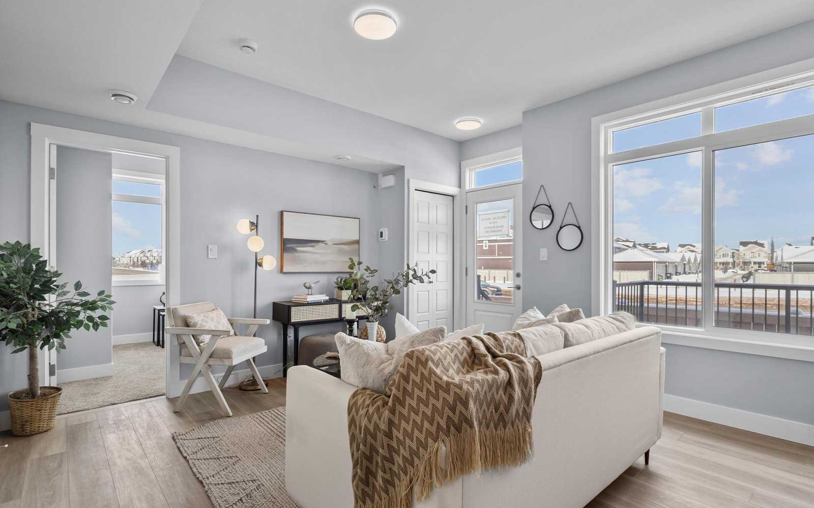 A photo of the great room of the Coltrane townhome model by Brookfield Residential