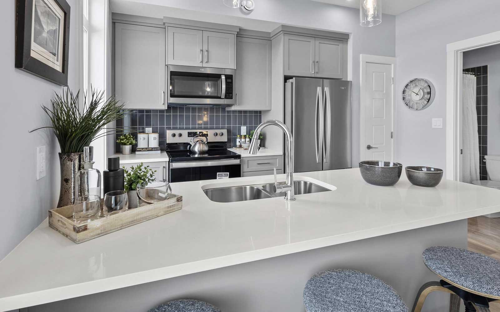 A photo of the kitchen of the Coltrane townhome model by Brookfield Residential