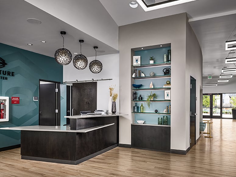 Welcome desk at the Venture Center at Brighton Crossings in Colorado