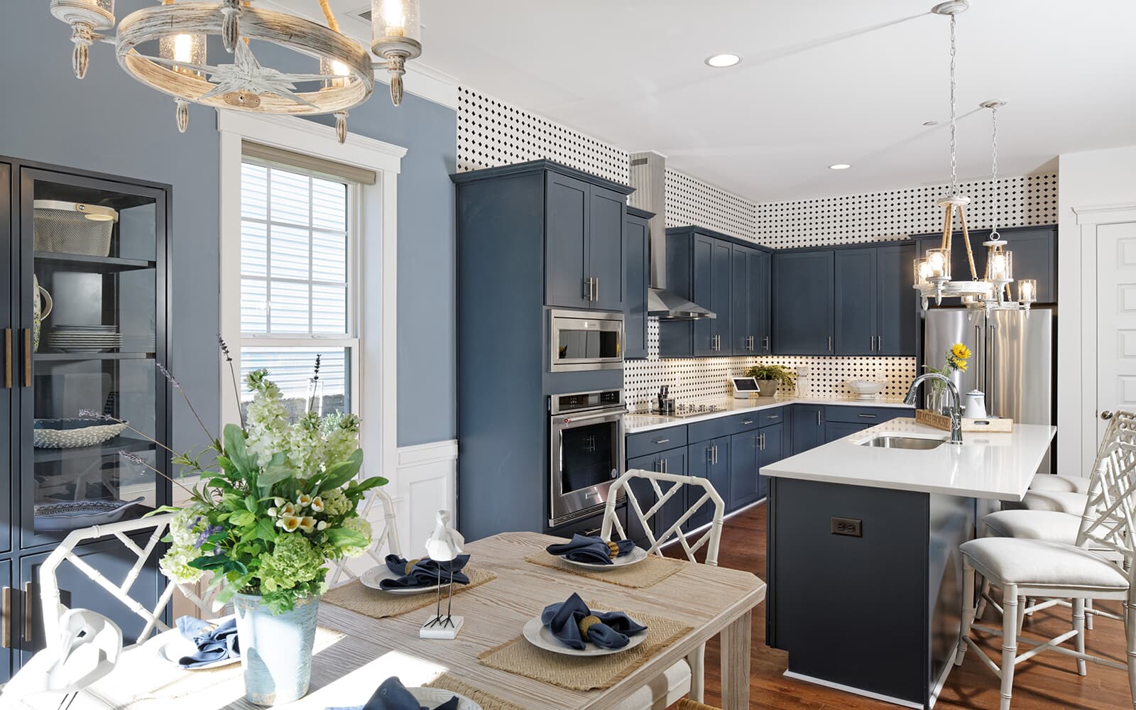 The view of the kitchen from the dining room in the Monet by Brookfield Residential