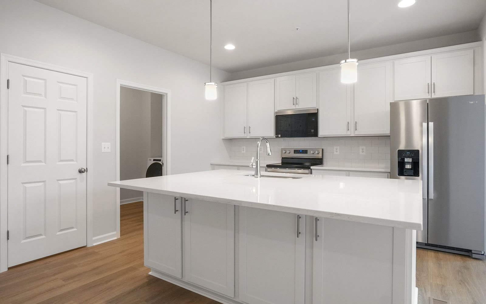 The kitchen of the Savoy II on homesite 3008 at Swan Point.