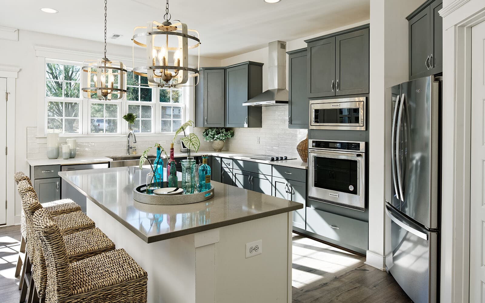 The island in the kitchen of the Beckham by Brookfield Residential