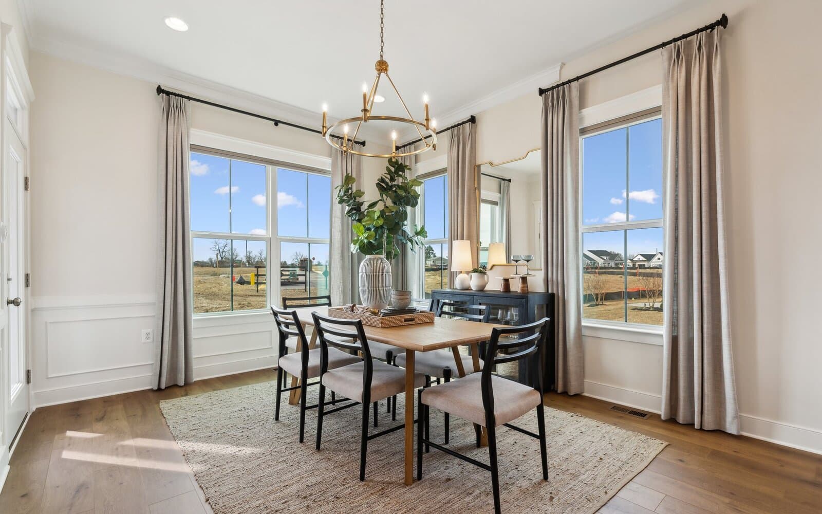 The dining room in the Matisse model single family home at Lakeside at Trappe by Brookfield Residential.