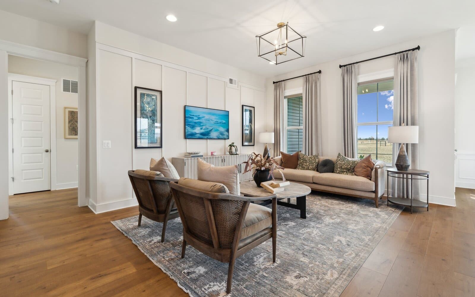 The family room in the Matisse model single family home at Lakeside at Trappe by Brookfield Residential.