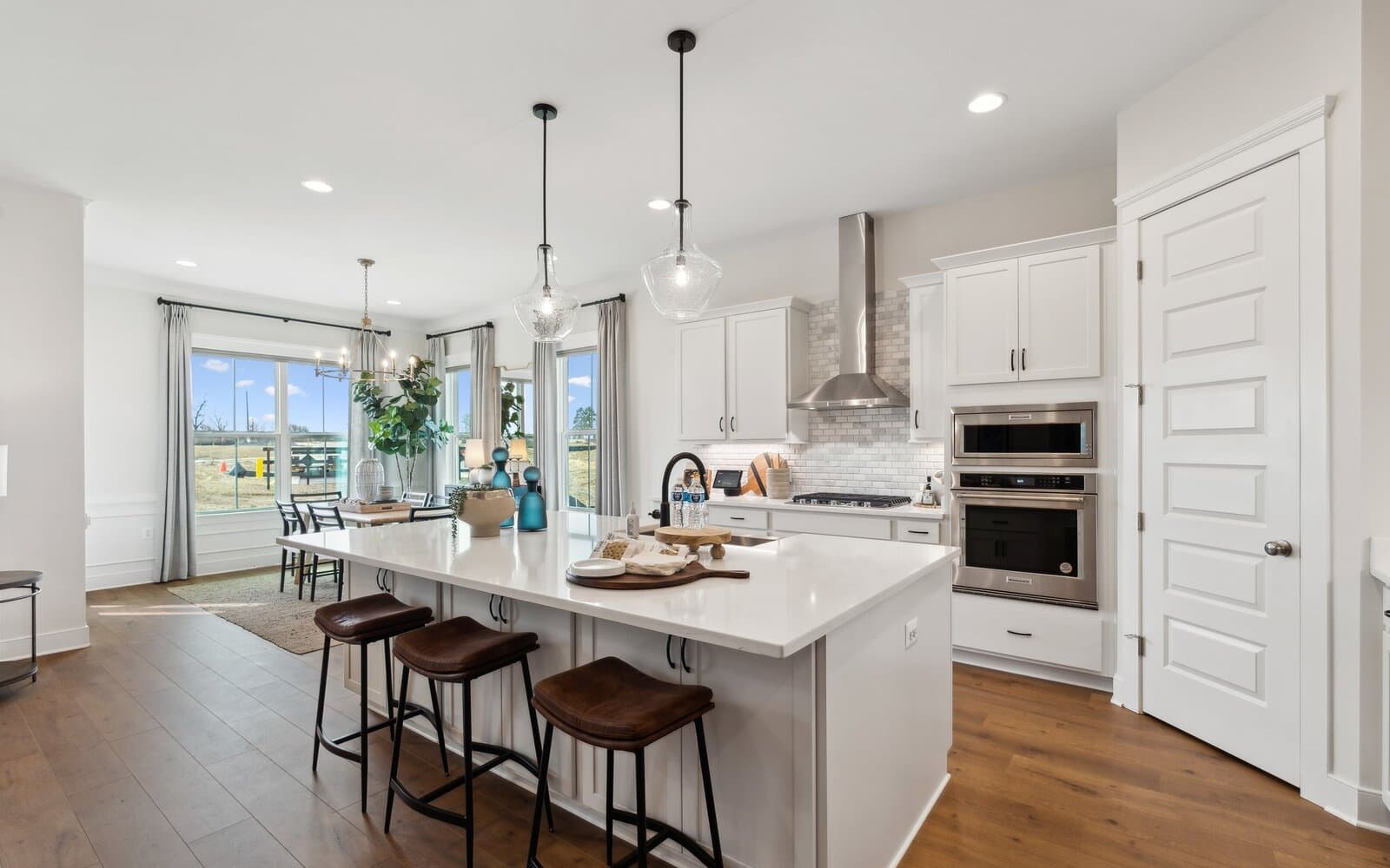 The kitchen in the Matisse model single family home at Lakeside at Trappe by Brookfield Residential.
