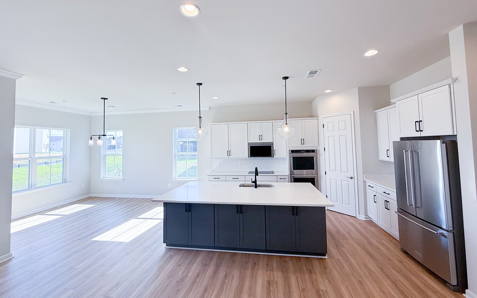 The kitchen and dining room of the Matisse on homesite 1132 at Lakeside at Trappe by Brookfield Residential.