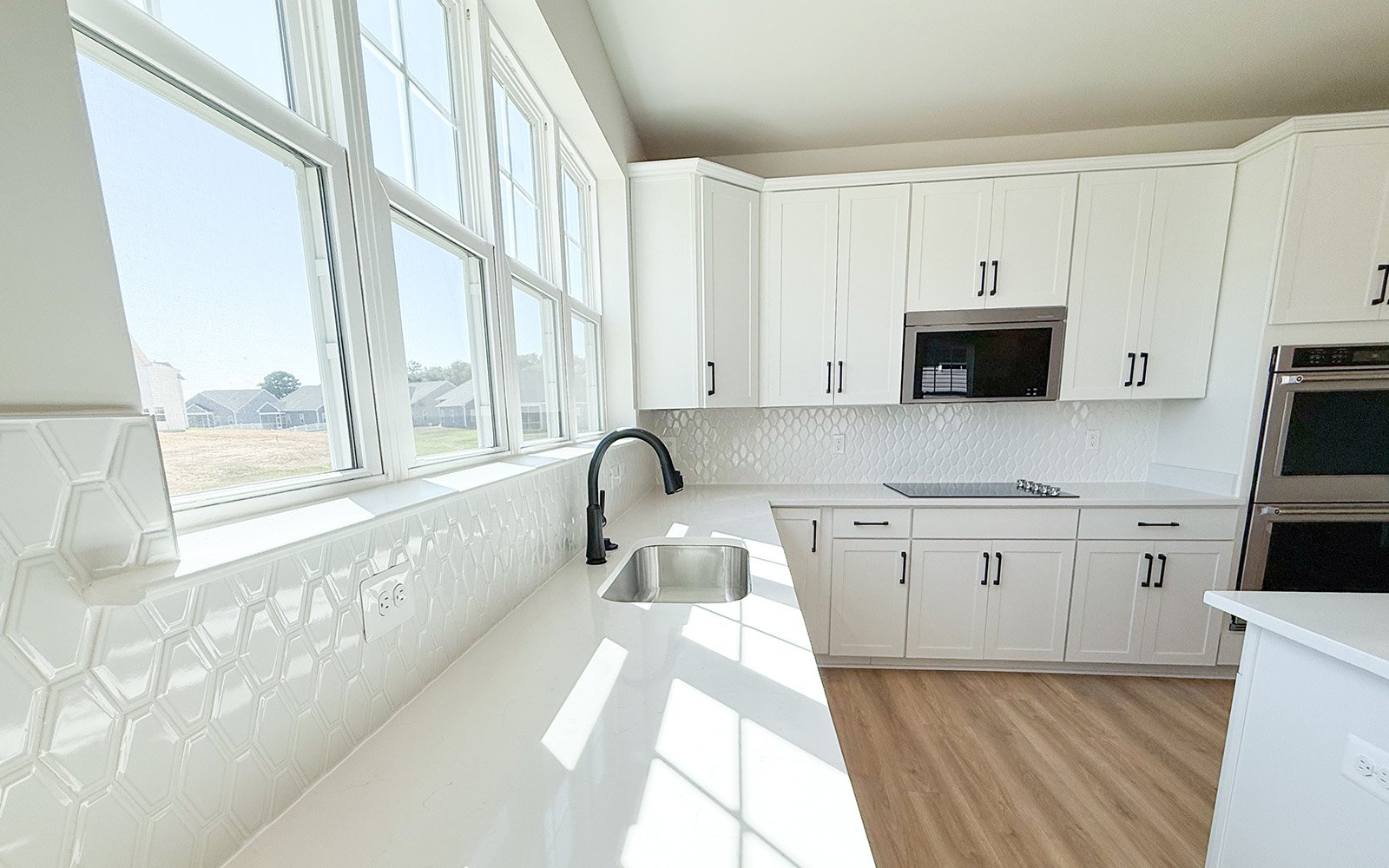 The kitchen in the Beckham on homesite 1134 at Lakeside at Trappe by Brookfield Residential.