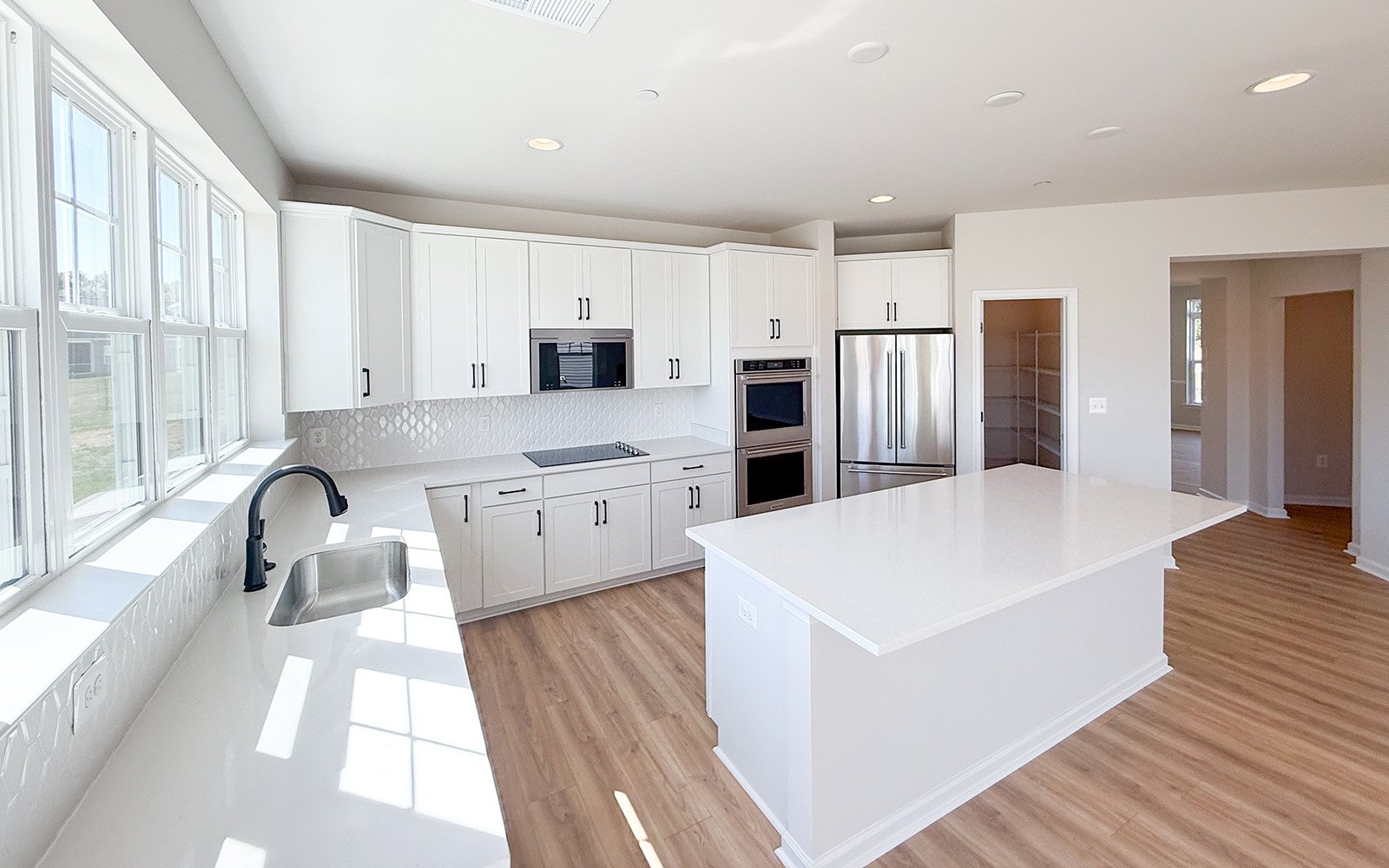 The kitchen in the Beckham on homesite 1134 at Lakeside at Trappe by Brookfield Residential.