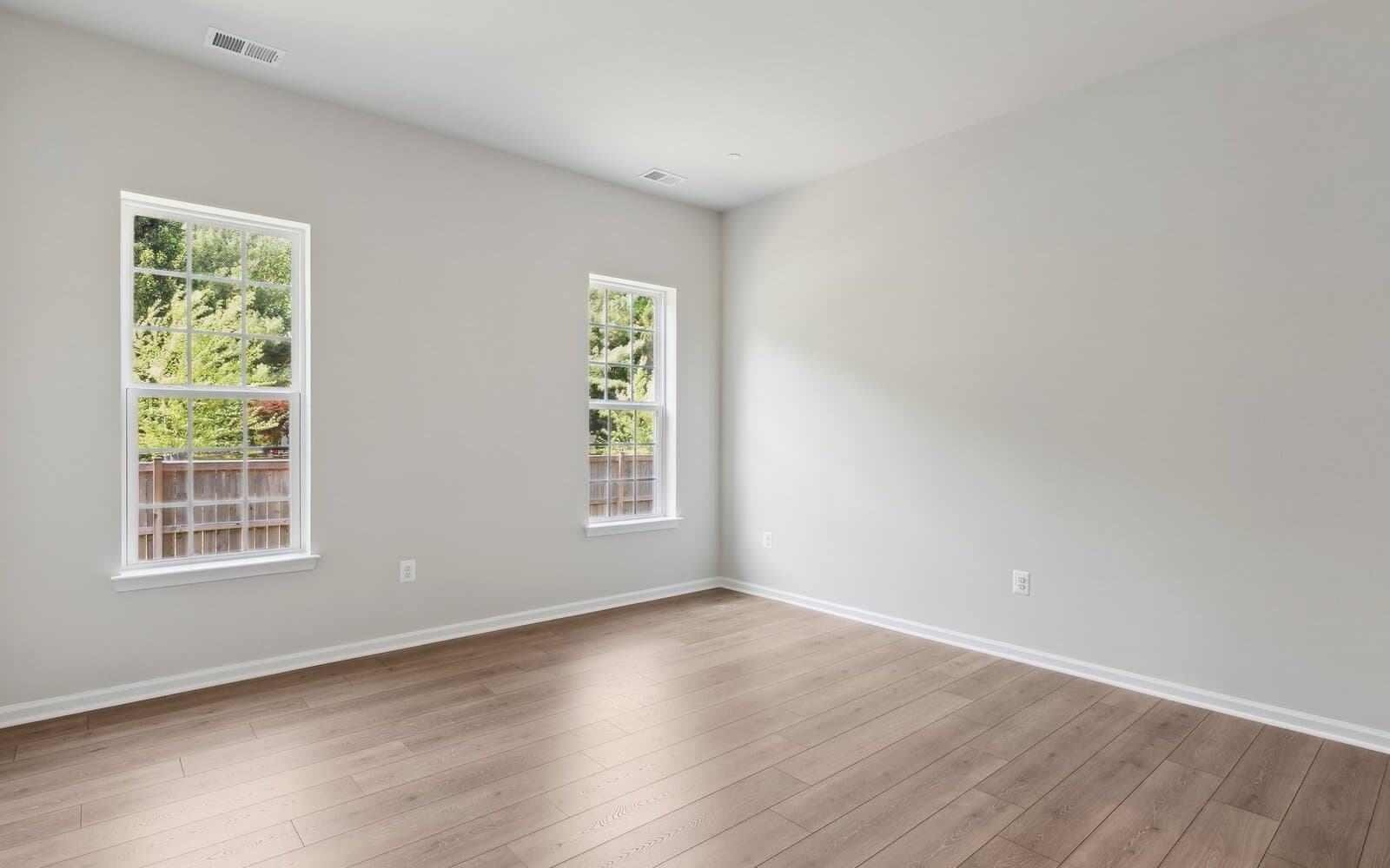 The main level primary bedroom of the Douglas on homesite 1005 at Lakeside at Trappe.