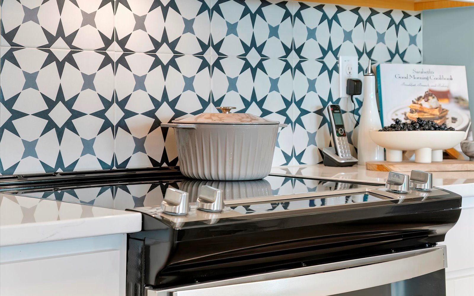 The kitchen stovetop of the Lennox townhomes.