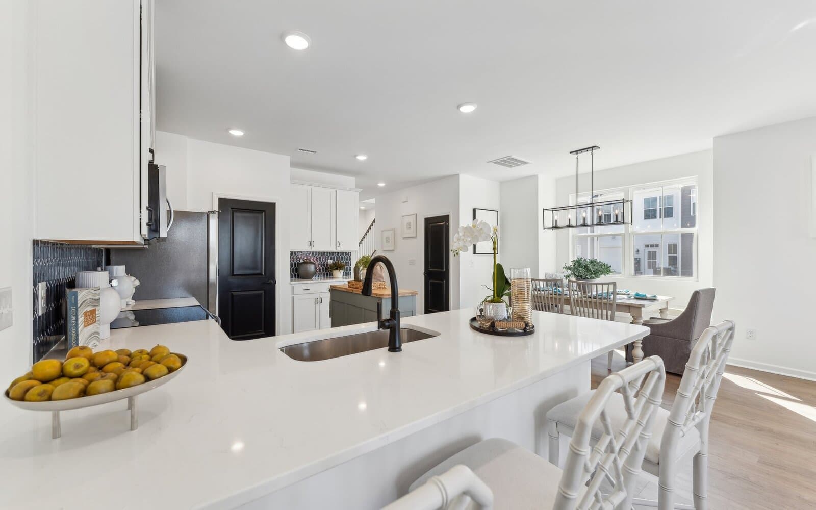 The kitchen of the Morgan townhome model by Brookfield Residential at Wendell Falls.