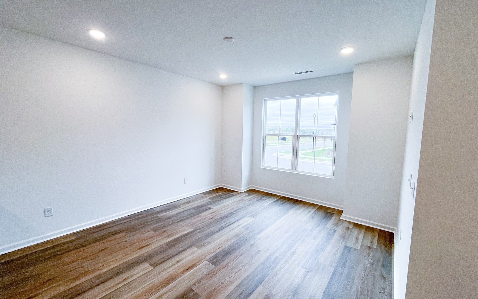 The family room in the Morgan on homesite 2548 by Brookfield Residential at Wendell Falls.