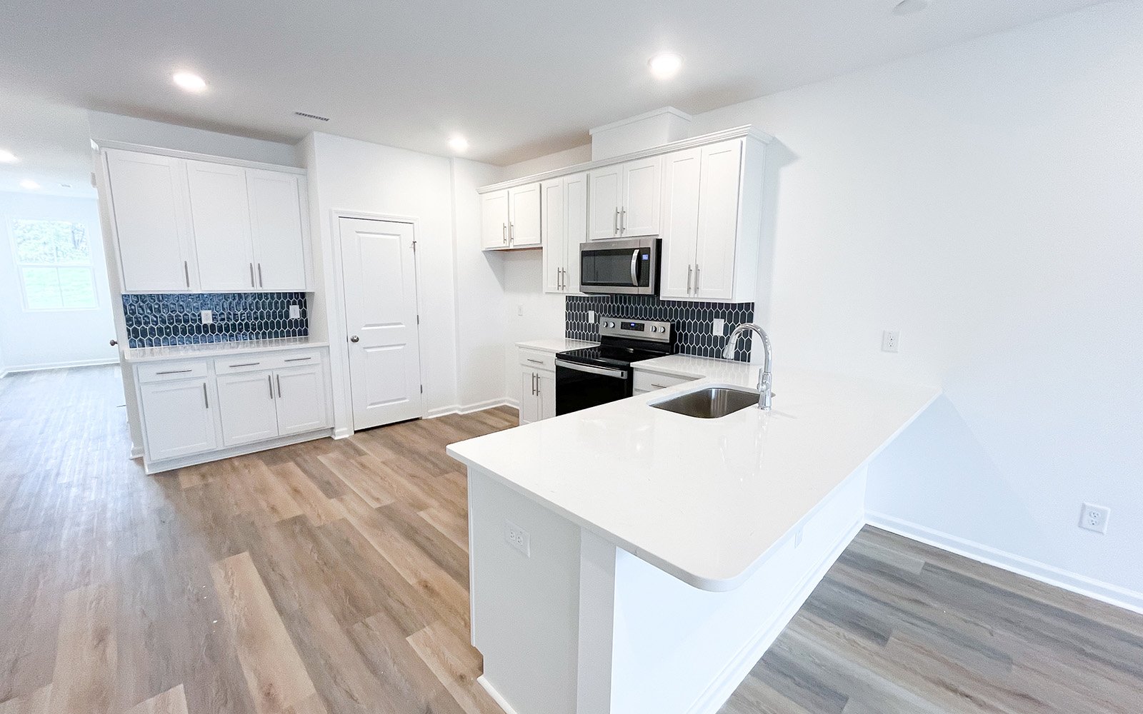 The kitchen in the Morgan on homesite 2548 by Brookfield Residential at Wendell Falls.