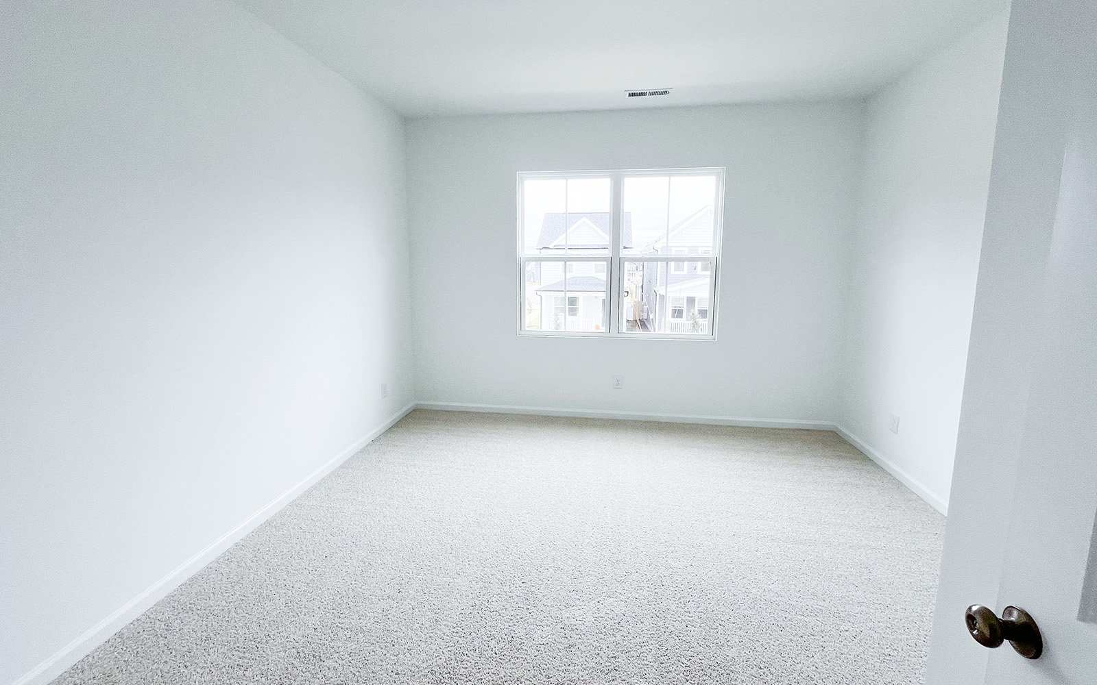 A secondary bedroom in the Morgan on homesite 2548 by Brookfield Residential at Wendell Falls.