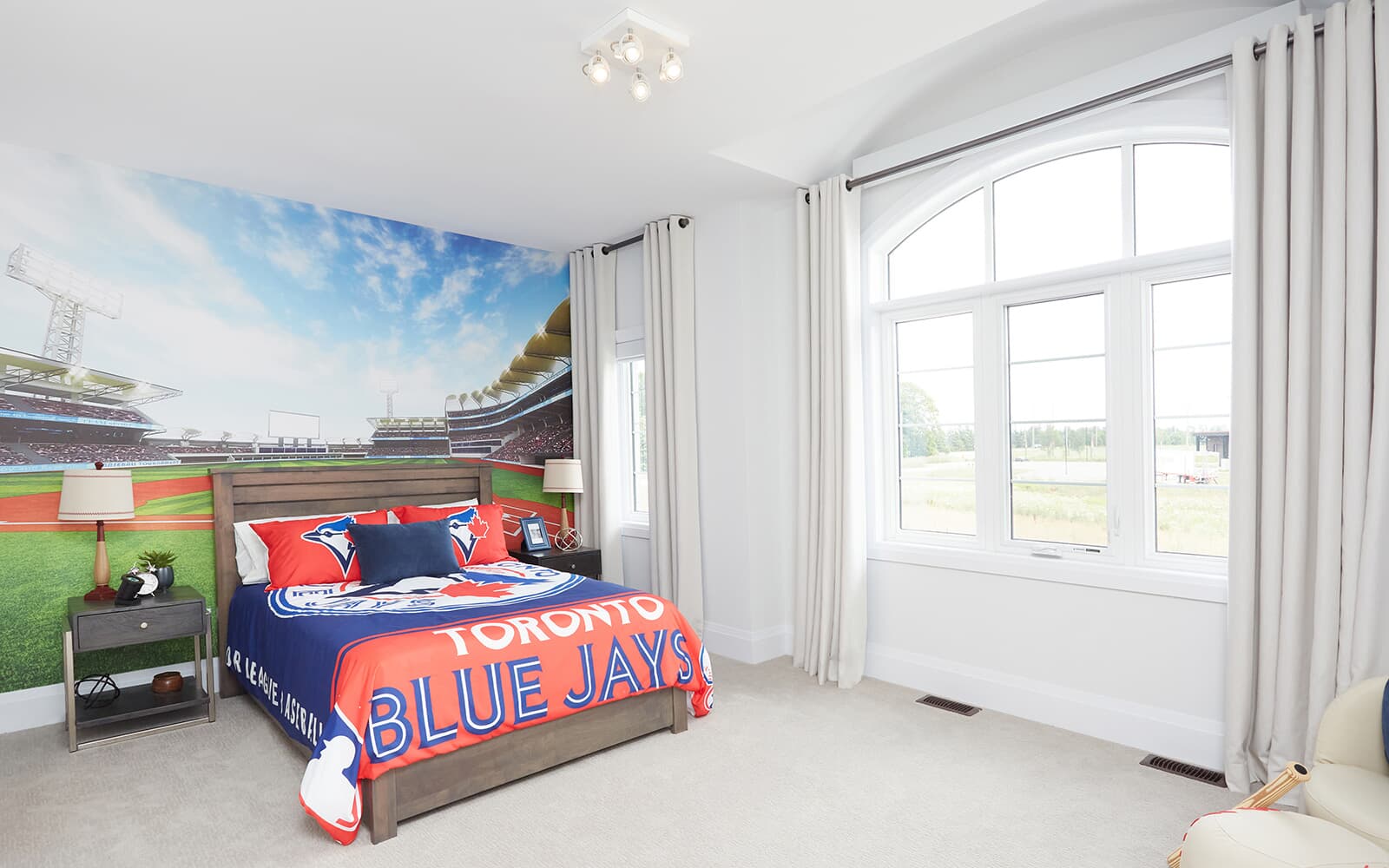 Bedroom 2 in the Hickling Model Home at Midhurst Valley in Midhurst, Ontario.