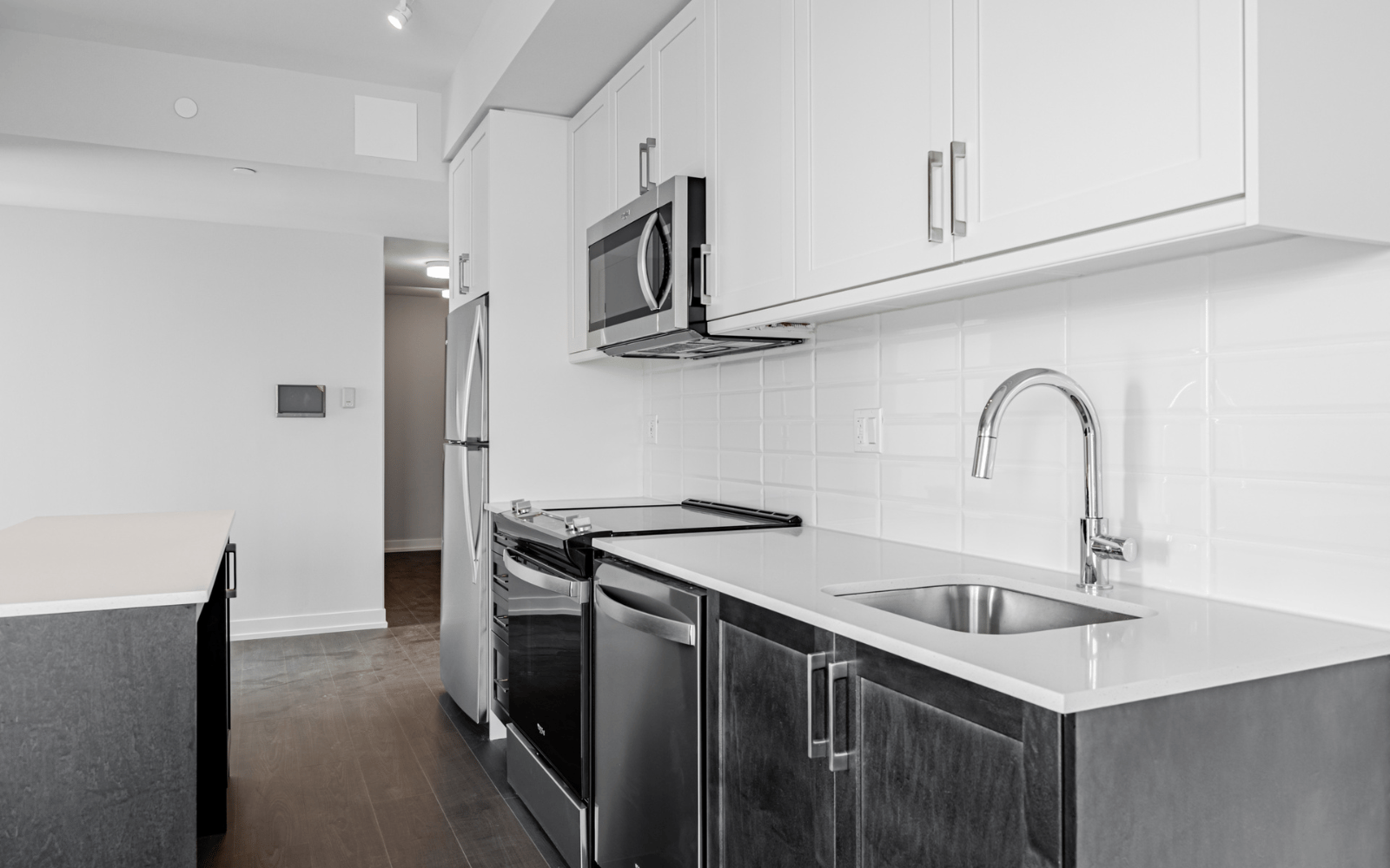 Photo of the kitchen in Suite 208 at Station No. 3 in Whitby, ON